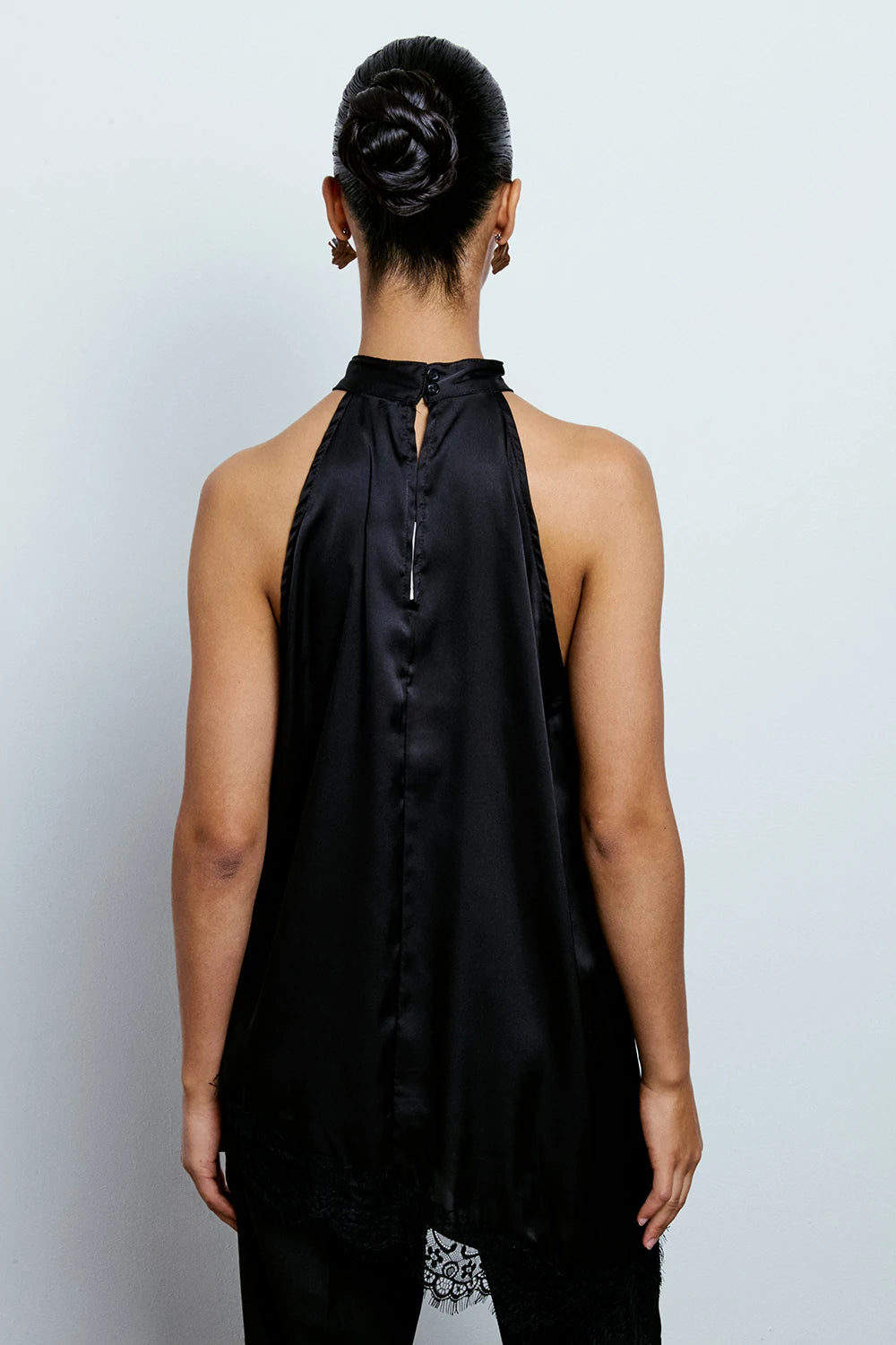 Top halter asimmetrico