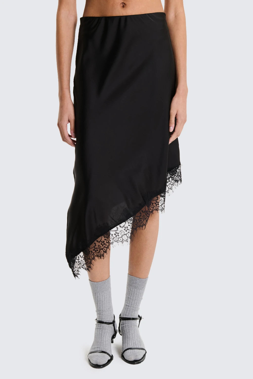 Gonna asimmetrica con pizzo